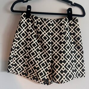 Mod style patterned mini shorts
